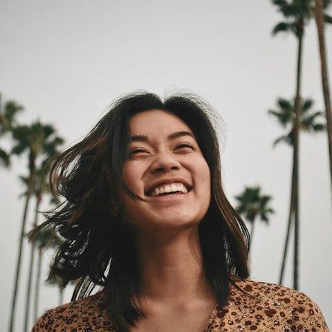 Laughing woman outdoors